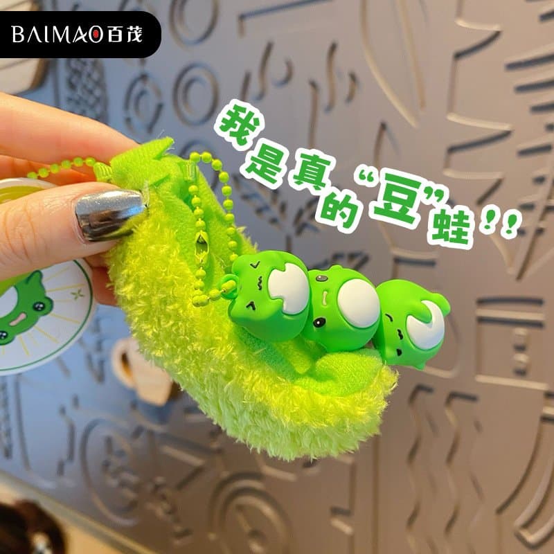 Baimao 원래 봉제 인형 키 체인 펜던트 분리 가능한 완두콩 개구리 인형 남성과 여성의 학교 가방 키 체인 매달려 장식품 - 이미지 1